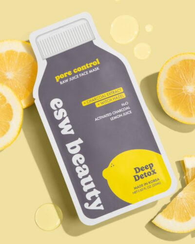 ESW Beauty Deep Detox Pore Control Raw Juice Sheet Mask styled with fresh lemon slices and serum drops on a yellow background.