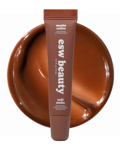 Mocha Coffee Smoothie Lip Treatment tube displayed over a glossy brown swatch on a white background.