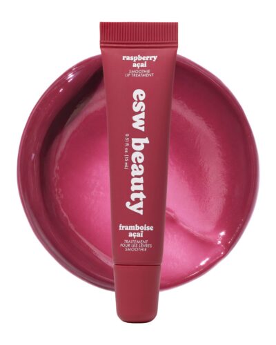 Raspberry Açai Smoothie Lip Treatment tube displayed over a glossy rich berry swatch on a white background.