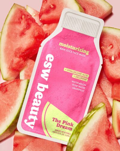 ESW Beauty The Pink Dream Moisturizing Raw Juice Sheet Mask styled with fresh watermelon slices on a pink background.